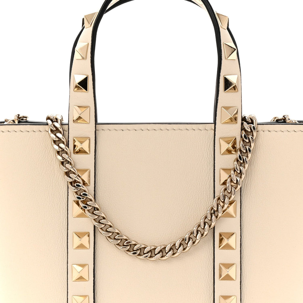 Pebbled Calfskin Rockstud North South Crossbody Bag Light Ivory