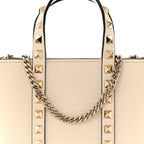 Pebbled Calfskin Rockstud North South Crossbody Bag Light Ivory