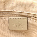 Monogram Margaux Calfskin Medium Sukey Top Handle Bag Beige Ebony Mystic White