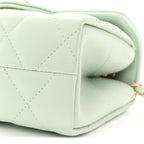 Caviar Quilted Retro Twist Top Handle Clutch Light Green