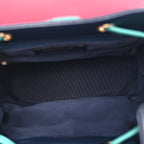 Goatskin Quilted Duma Drawstring Backpack Navy Turquoise Pink