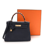 Togo Horseshoe Au Galop Kelly Retourne 28 Bleu Nuit Rouge H Fauve