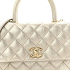 Metallic Aged Calfskin Quilted Mini Coco Handle Flap Gold