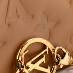 Lambskin Embossed Monogram Pochette Coussin Camel