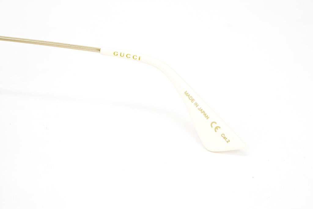 Gucci Women's Sunglasses Oversized Round Gold Maison de l'Amour