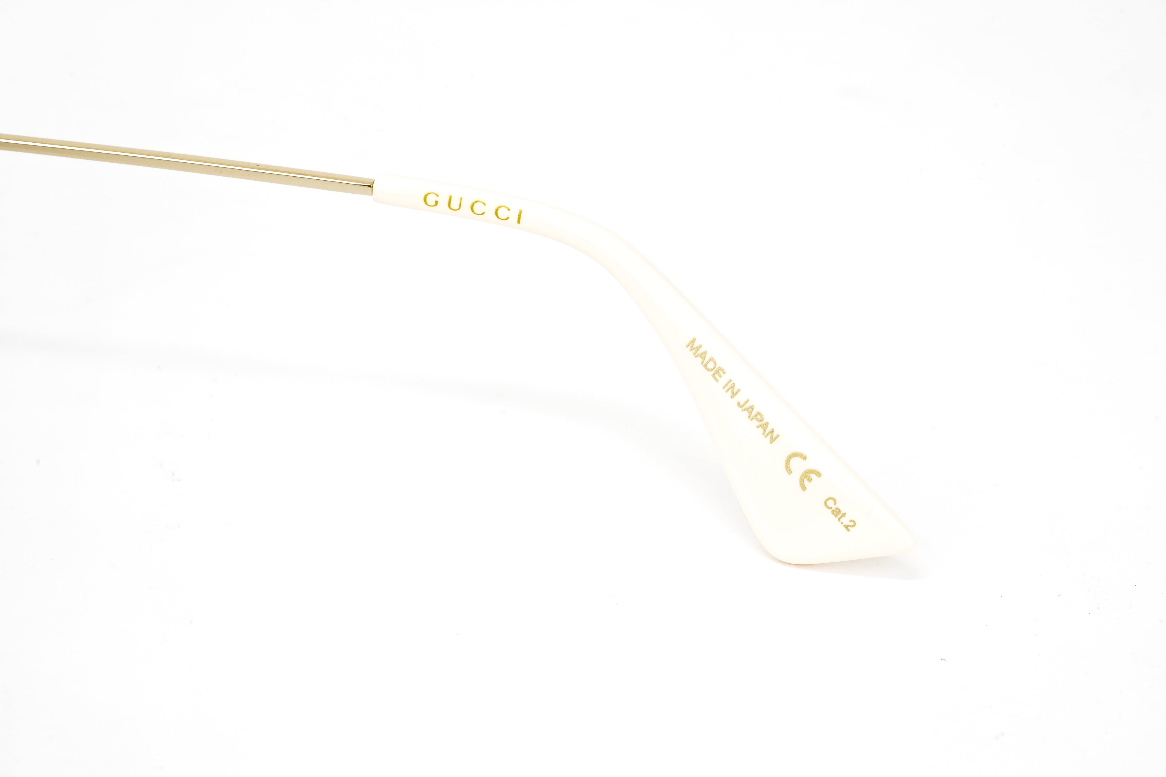 Gucci Women's Sunglasses Oversized Round Gold Maison de l'Amour
