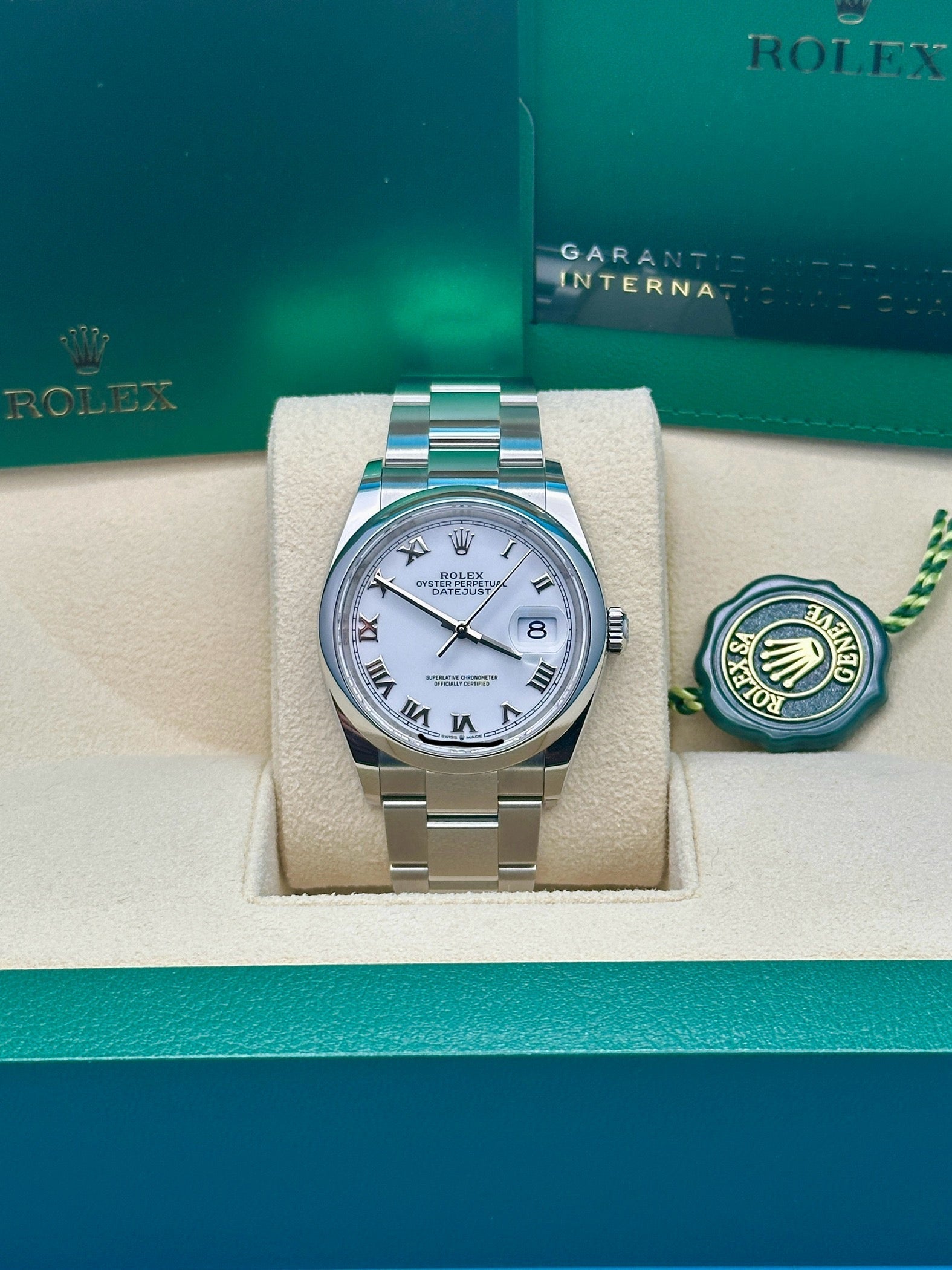 Rolex Steel Datejust 36  - White Roman Dial - Oyster Bracelet - 126200 wro