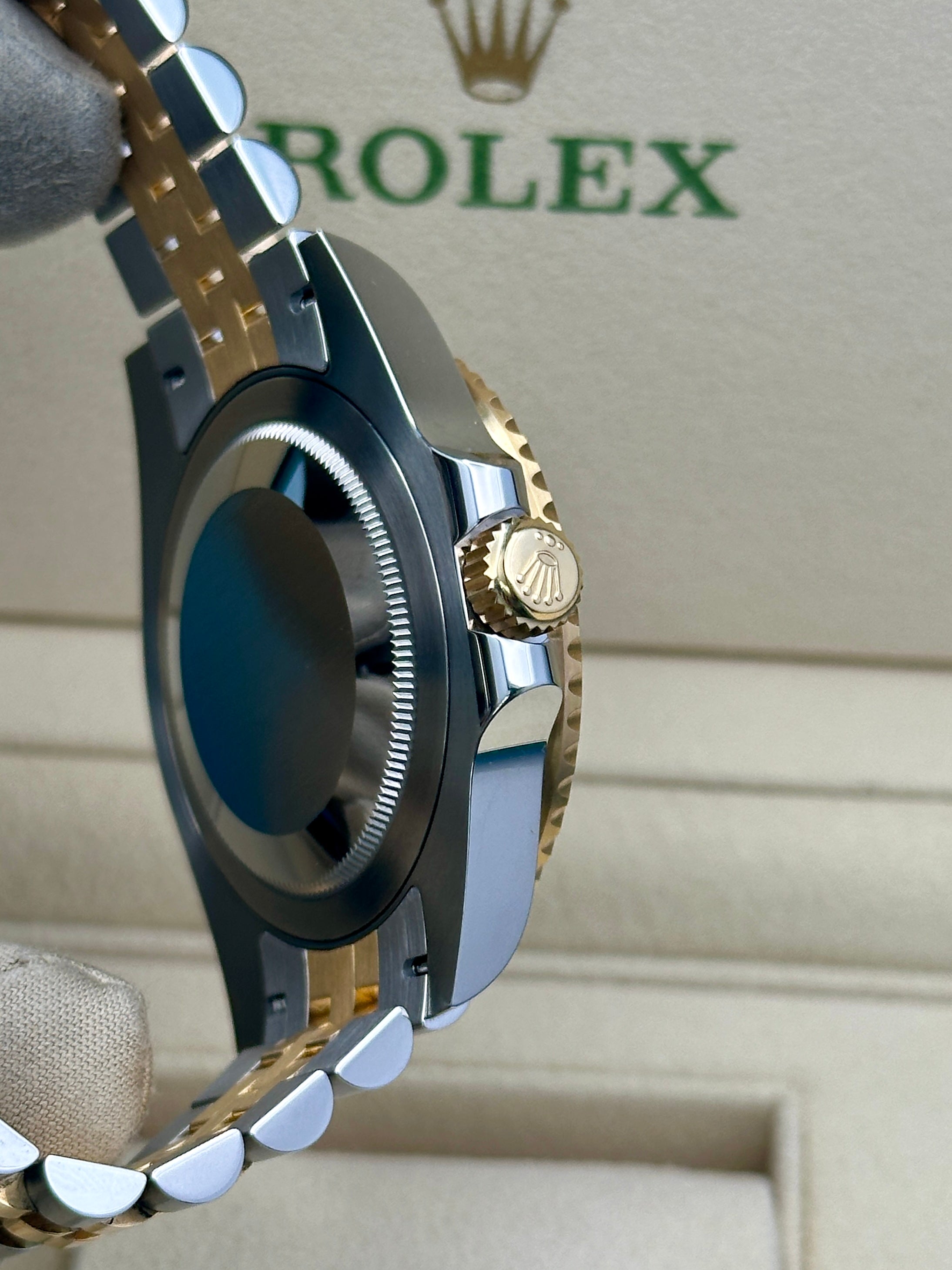 ROLEX GMT-Master II Black Dial Steel 18kt Yellow Gold