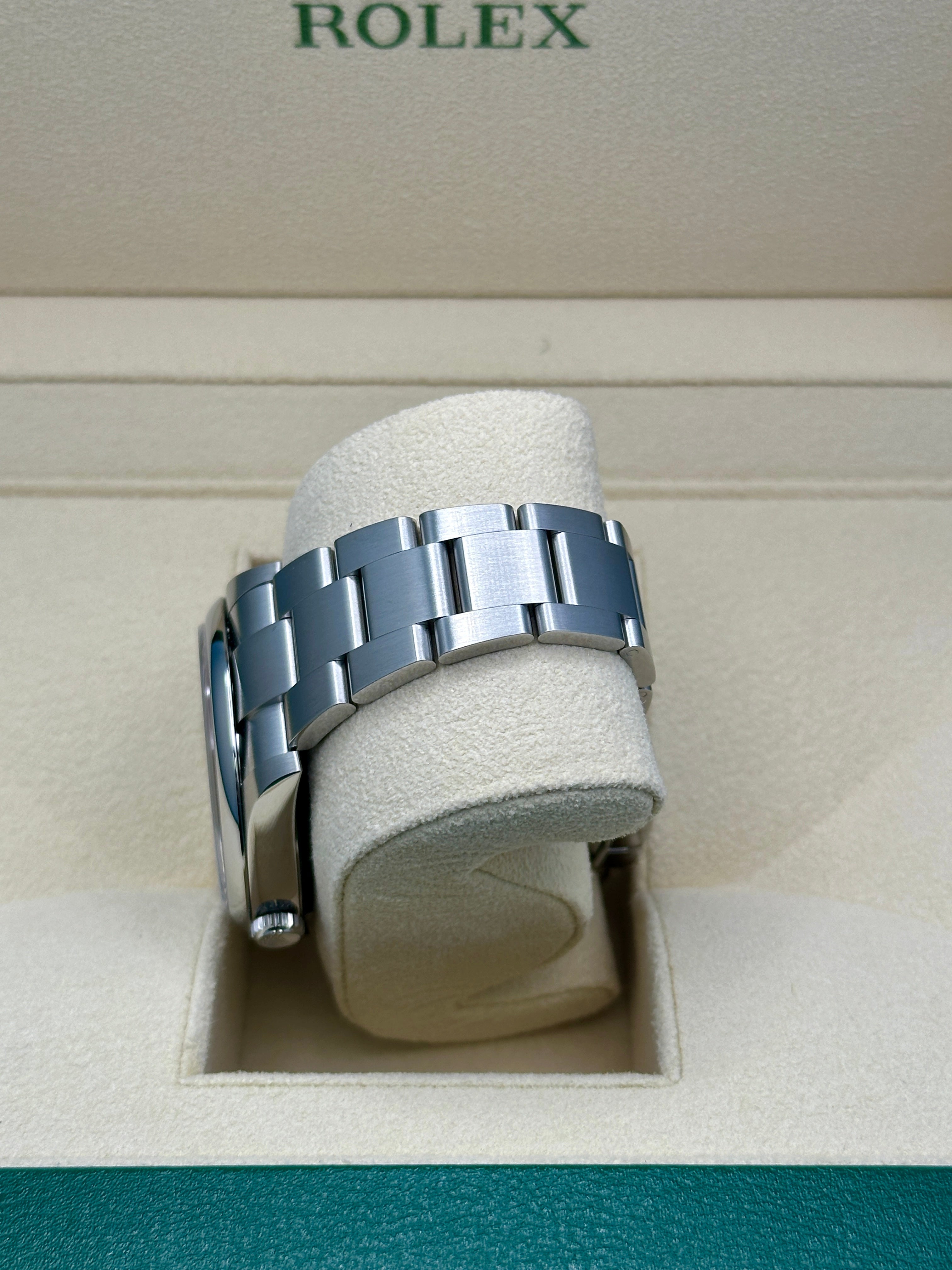 Rolex Oyster Perpetual 41 Turquoise Blue Celebration-motif Dial Stainless Steel Oyster 124300