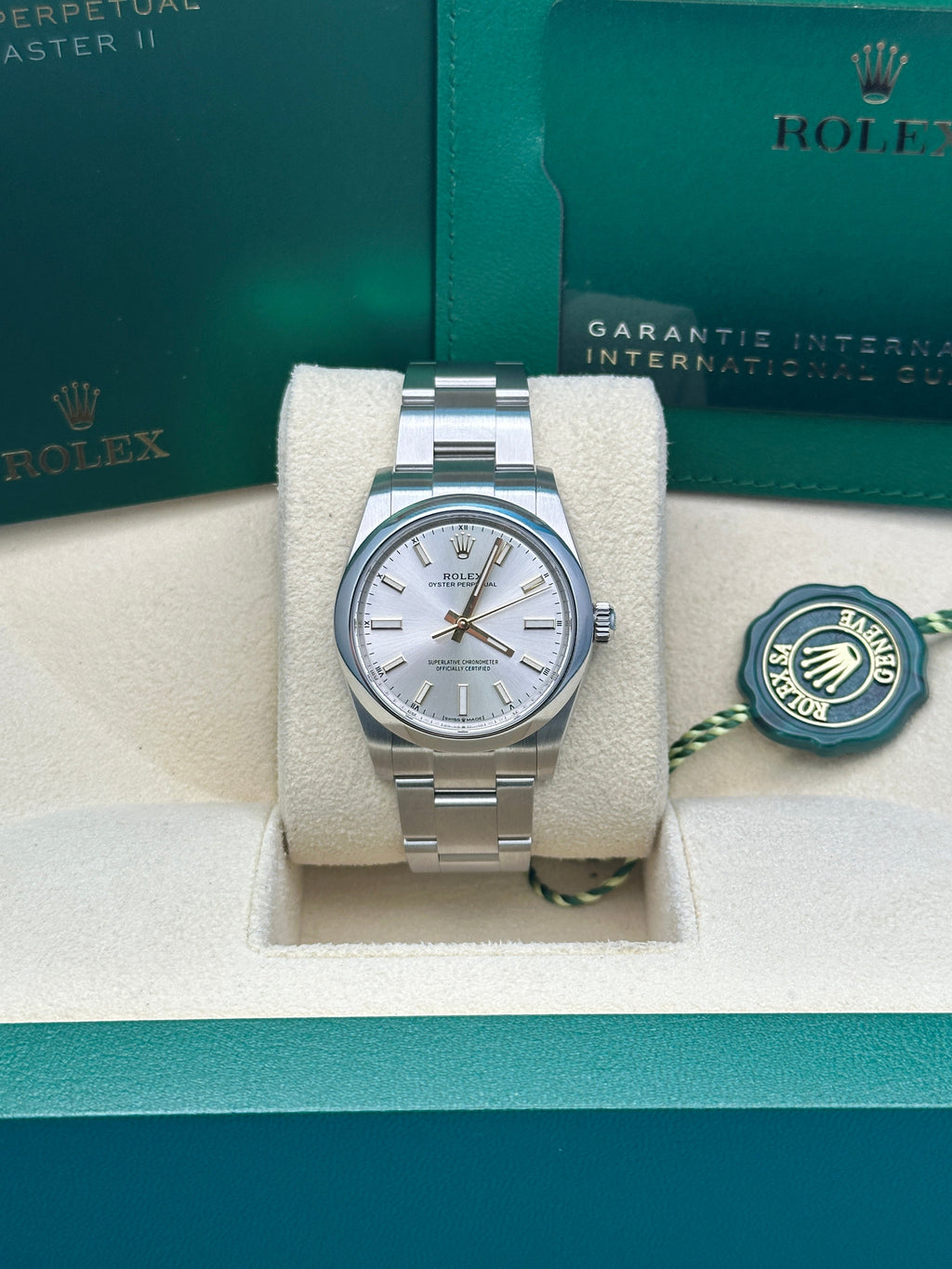 Rolex Oyster Perpetual 34 Watch - Domed Bezel - Silver Index Dial