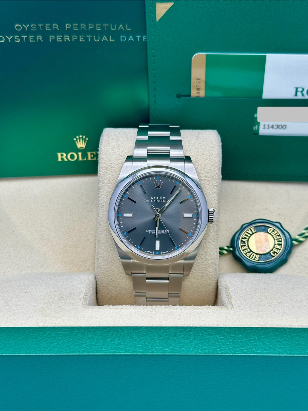 Rolex Steel Oyster Perpetual 39  - Dark Rhodium Index Dial - 114300 drio