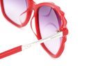 Swarovski Women's Flavia Sunglasses Cat Eye Red