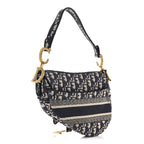 Oblique Embroidered Saddle Bag Blue