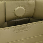 Calfskin Maxi Intrecciato Cassette Pouch On Strap Travertine