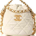 Caviar Quilted Coco First Bucket Clutch With Chain White