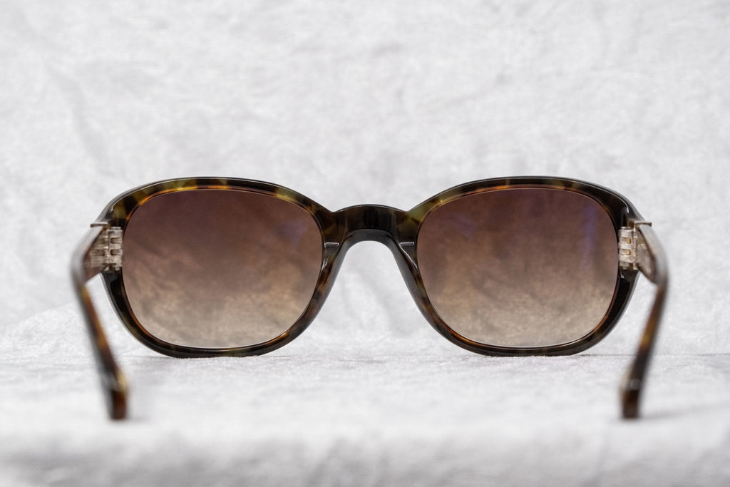 Ann Demeulemeester Ladies Sunglasses Oval Black and Brown Graduated