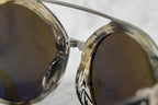 Ann Demeulemeester Ladies Sunglasses Round Hornet and Green
