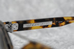 Ann Demeulemeester Sunglasses Round Tortoise Shell Titanium with Brown