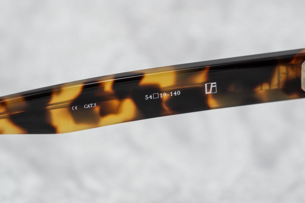Ann Demeulemeester Sunglasses Round Tortoise Shell Titanium with Brown