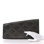 Triomphe Canvas Asymmetric Clutch Tan