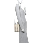 Pebbled Calfskin Rockstud North South Crossbody Bag Light Ivory