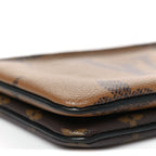 Reverse Monogram Giant Double Zip Pochette