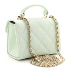 Caviar Quilted Retro Twist Top Handle Clutch Light Green
