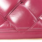 Paper Calfskin Maxi Intrecciato Padded Pouch Clutch Amaranto