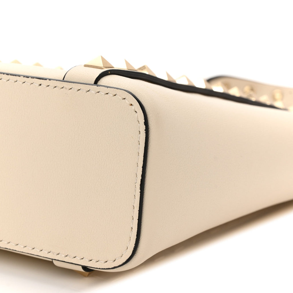 Pebbled Calfskin Rockstud North South Crossbody Bag Light Ivory