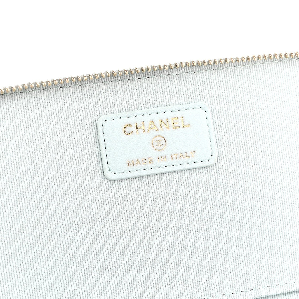 Lambskin Quilted Small Top Handle Vanity Case With Chain Light Blue