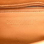 Nappa Maxi Intreccio Padded Cassette Crossbody Bag Caramel