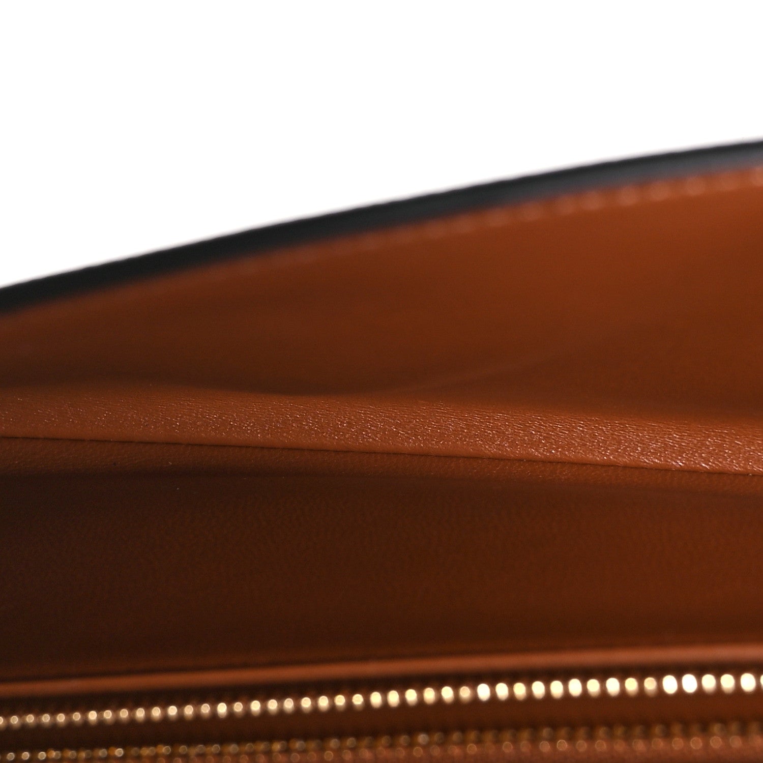 Triomphe Canvas Asymmetric Clutch Tan