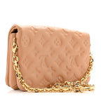 Lambskin Embossed Monogram Pochette Coussin Camel