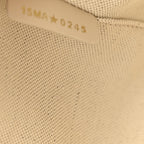 Oblique Calfskin Medium Signature Bucket Bag Beige