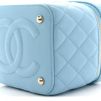 Caviar Quilted Top Handle Vanity Case With Chain Blue