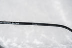 Kris Van Assche Sunglasses Round Shiny Black and Green